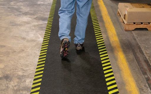 Insitu product image of non-slip, black and yellow Smartgrip Industrial matting Roll used in warehouse
