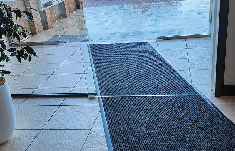 Insitu image of the Super Brush entrance mat with rubber edging.