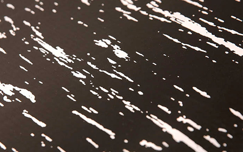 Close up image of the black and white sleek pattern of the tile top premier mat 