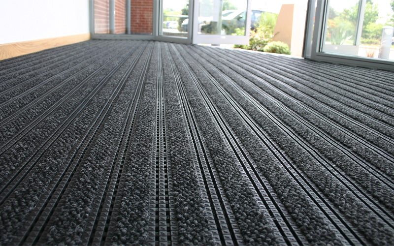 Insitu image of the designer vinyl tile at a building entrance