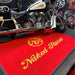 Insitu image of a Dirtstopper Logo Mat perfect for motorcycle displays.